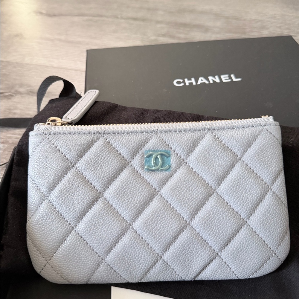 CHANEL Mini O case / pouch in Light Gray classic caviar quilt